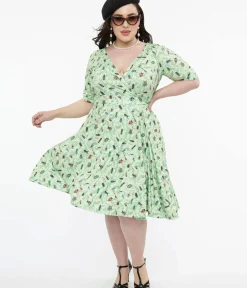 Unique Vintage Fit & Flare|Wrap Dresses>Dolly & Dotty 1950s Mint Green Nothing But Bugs Print Matilda Wrap Dress
