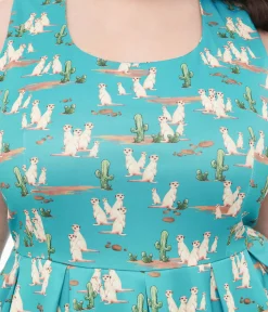 Unique Vintage Swing|Pocket Dresses>Dolly & Dotty 1950s Turquoise Meerkat Print Amanda Swing Dress