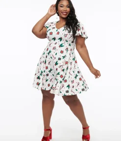 Unique Vintage Fit & Flare|Pocket Dresses>Plus Size 1950s Ivory Christmas Print Poppy Flare Dress