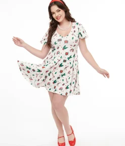 Unique Vintage Fit & Flare|Pocket Dresses>1950s Ivory Christmas Print Poppy Flare Dress