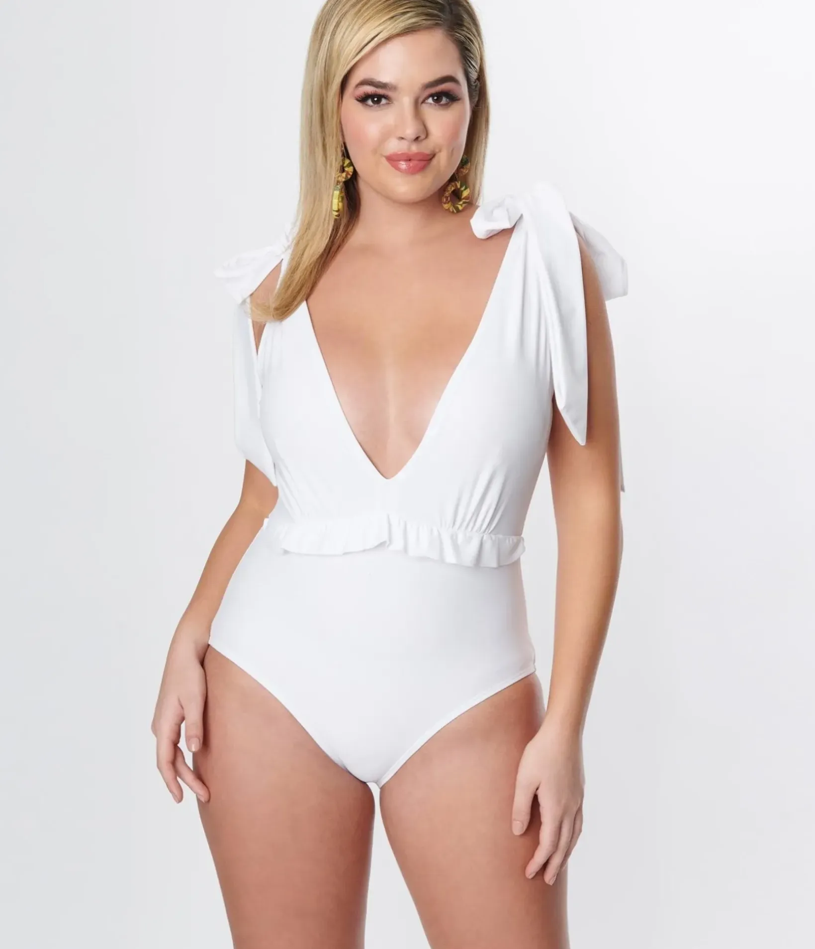 Unique Vintage One Piece Swim>White Plunge One Piece Swimsuit